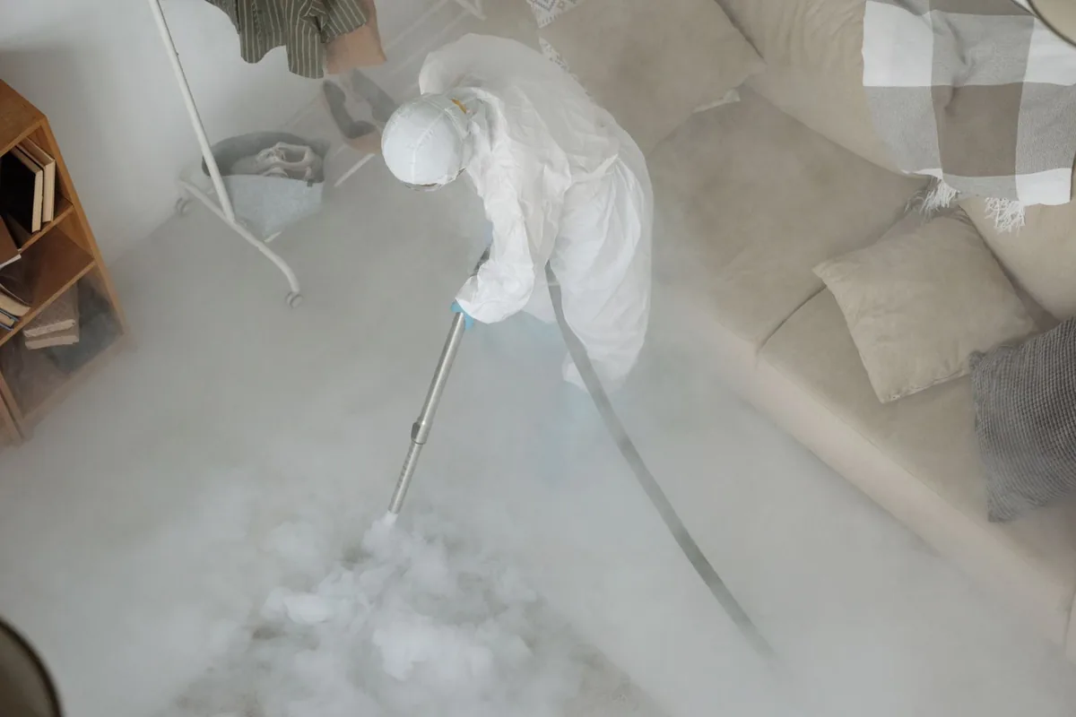 Biohazard cleanup technician in protective equipment, Westshore Palms, Tampa, FL